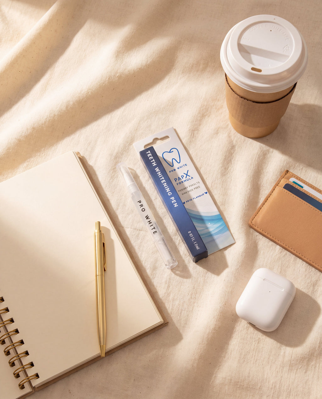Pro White PAP-X Teeth Whitening Pen — lifestyle flat lay
