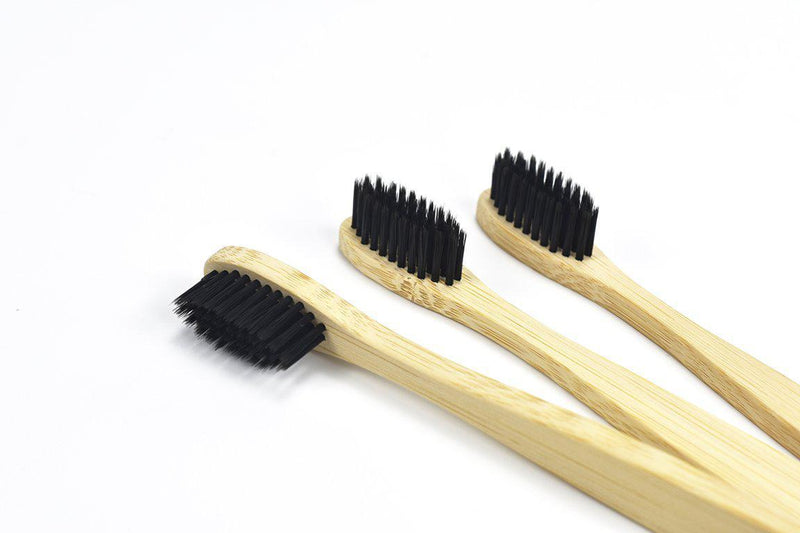 A close up image of Pro White Teeth Kits environmentally friendly Activated Charcoal Bamboo Toothbrush