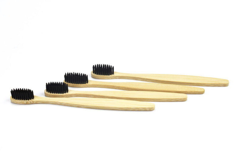 a bundle of Pro White Teeth Kits environmentally friendly Activated Charcoal Bamboo Toothbrush